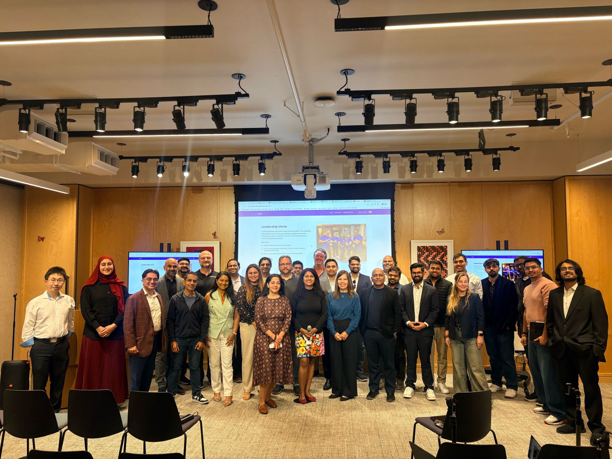 Group photo of founders, investors, and executives at the AI Executive Summit gathering
